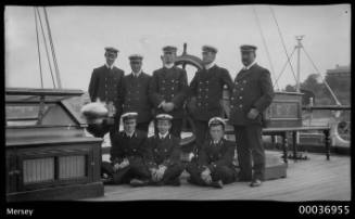 MERSEY group photo with ship's officers