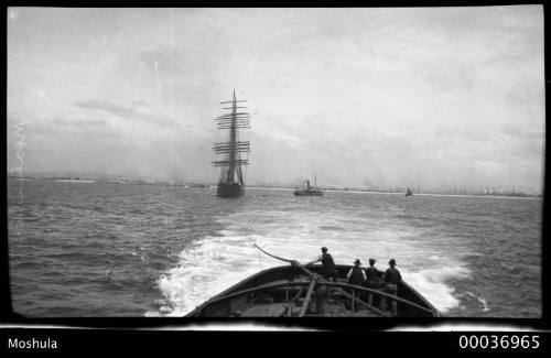 Four masted barque MOSHULU leaving port under tow