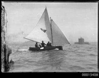 Small gaff rigged dingy sails on harbour near Fort Denison