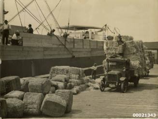 Loading bales of hay