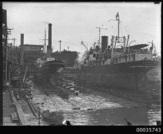 SS CAPTAIN COOK pilot steamer and SS SAINT ANDRE in dry dock