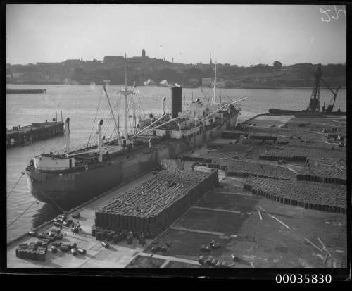 MV NEPTUNIAN unloading oil drums for H C Sleigh at Johnstons Bay in Sydney