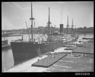 MOSEL unloading oil drums at Johnstons Bay in Sydney