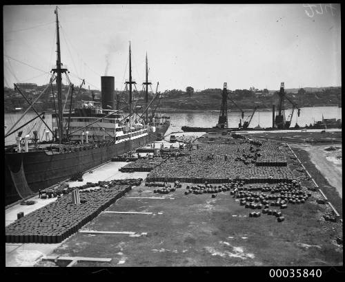 MOSEL unloading oil drums at Johnstons Bay in Sydney