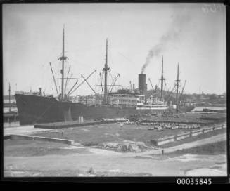 MOSEL unloading oil drums at Johnstons Bay, Pyrmont, Sydney.