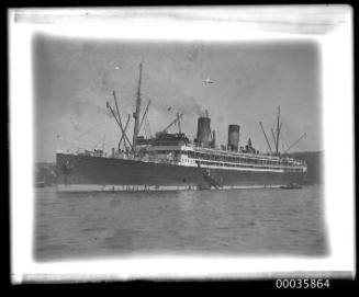 View of unknown cargo passenger ship in harbour.