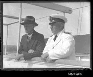 Captain and male passenger on deck of SS RUNIC possibly at Millers Point, Sydney