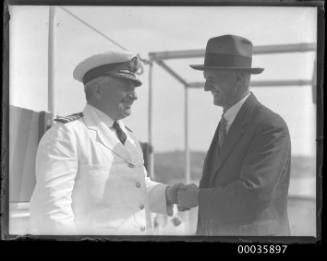 Captain and male passenger on deck of SS RUNIC possibly at Millers Point, Sydney