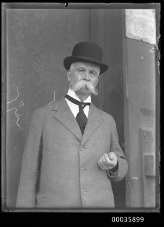 Portrait of elderly man with large moustache on board SS RUNIC possibly at Millers Point, Sydney