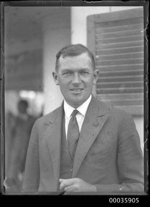 Portrait of male passenger on deck of SS RUNIC possibly at Millers Point, Sydney