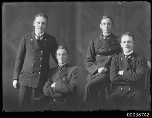 Two studio portraits of two men in suits.