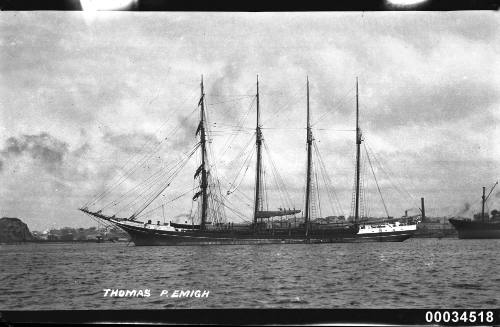 View of THOMAS P. EMIGH four mast barquentine anchored in harbour.