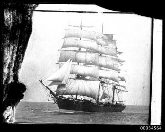 Three mast fully rigged ship.