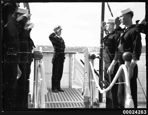 US Navy officers and sailors on board USS ASTORIA