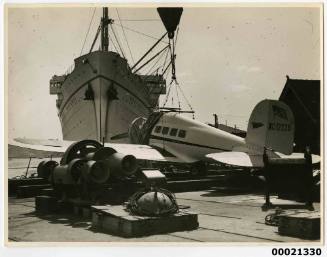 Aeroplane being unloaded from the TSS MONTEREY