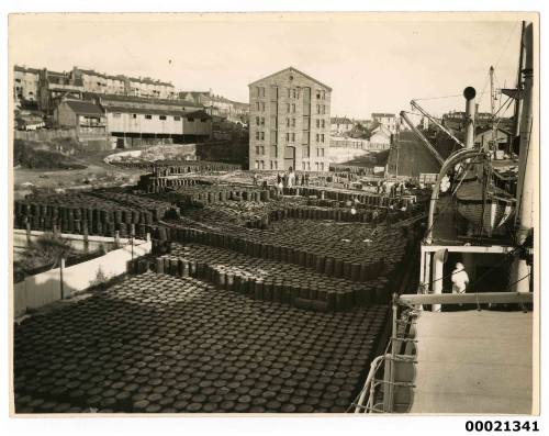 Unloading oil drums in Pyrmont