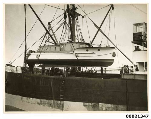 Unidentified motor launch, possibly a Lloyd Wright design transported from Brisbane, being lowered from SS CARLISLE