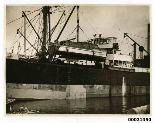 Unidentified motor launch, possibly a Lloyd Wright design transported from Brisbane, being lowered from SS CARLISLE