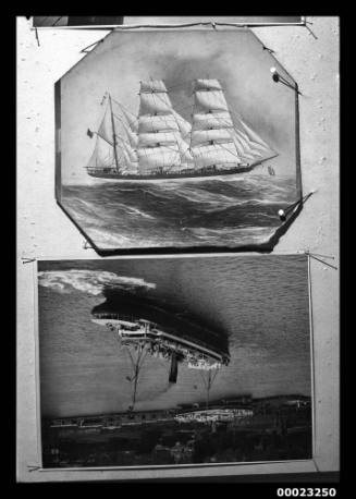 Photograph of two unknown vessels pinned to a notice board