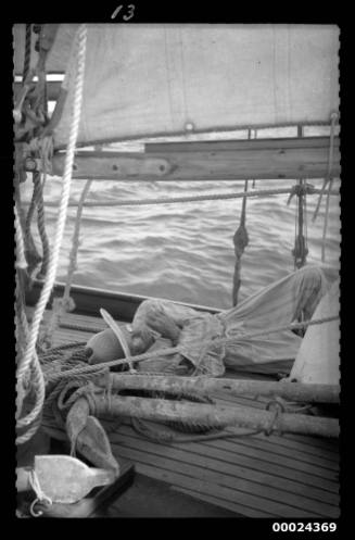 Harold Nossiter Snr lying on the deck of SIRIUS