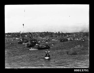 Spectators on Sydney Harbour viewing a rowing regatta