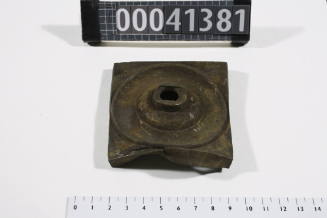 Metal base recovered from the wreck of the DUNBAR
