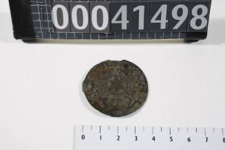 Metal disk with ornament