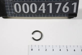 Ring like metal fitting recovered from the wreck of the DUNBAR