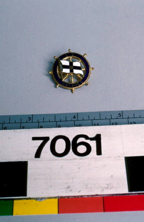 Orient Line SS ORCADES brooch in the shape of a ship's wheel