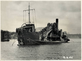 Dredge PLUTO operating in dock entrance