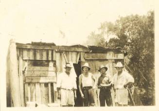 George and Willy Clark at a shed