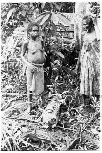 View of two women in a jungle setting