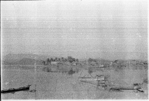 View of three moored canoes