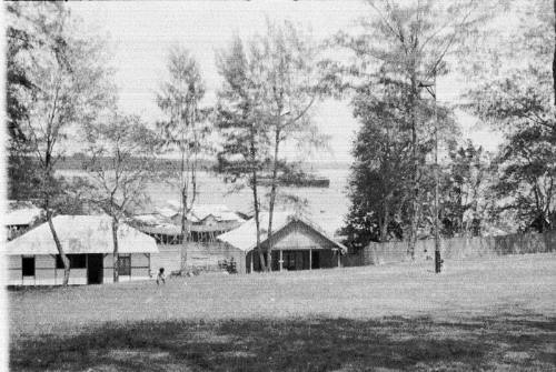 View of houses and huts on a foreshore 