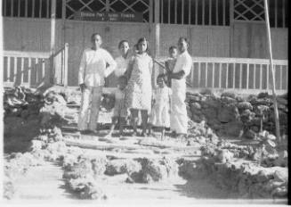 View of Oskar Speck and others in front of a church at Adodo Fordata, Indonesia