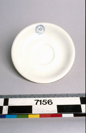 White saucer from Adelaide Steamship Company. 

