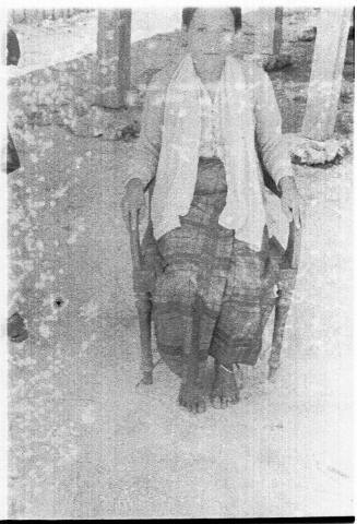 View of a young woman sitting on chair