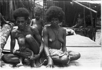 View of a family seated on a platform 