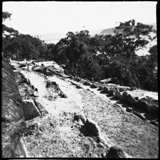 View of cleared land with a retaining wall