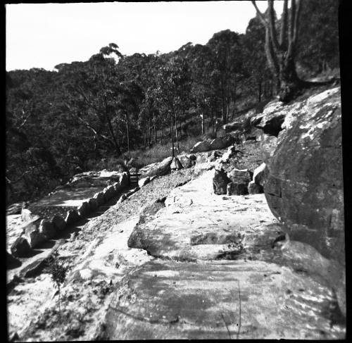 View of a rock platform with a retaining wall 