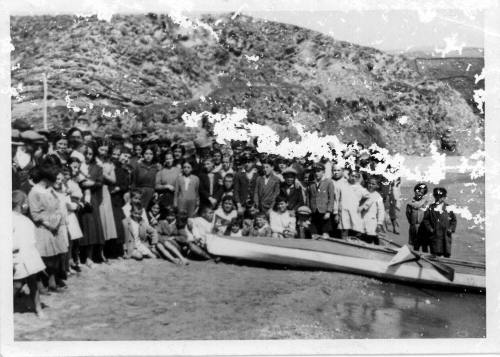 View of people with Oskar Speck's kayak SUNNSCHIEN in Andros, Greece