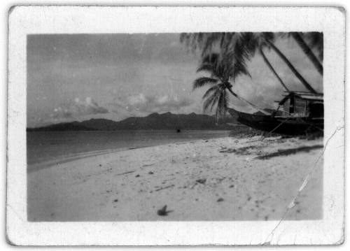 View of a beach with boat pulled ashore 