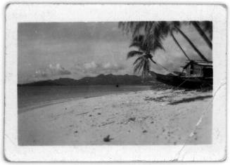 View of a beach with boat pulled ashore 