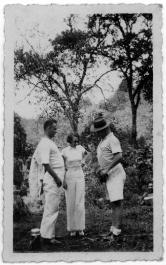 View of three people in a garden  