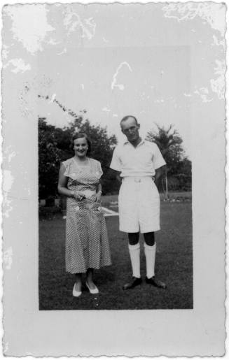 View of Oskar Speck and a woman in a garden 