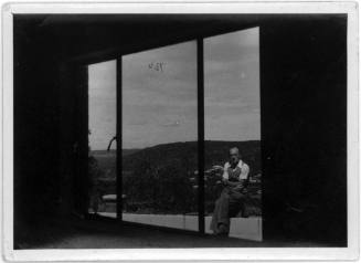 View of Oscar Speck through a window from his house in Killcare 