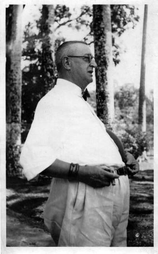 View of a man with a cigar outdoors 