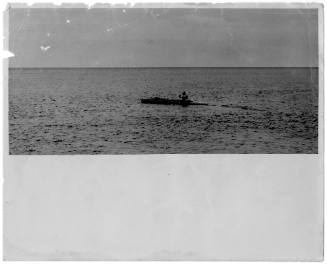 View of Oskar Speck paddling his kayak SUNNSCHIEN at sea