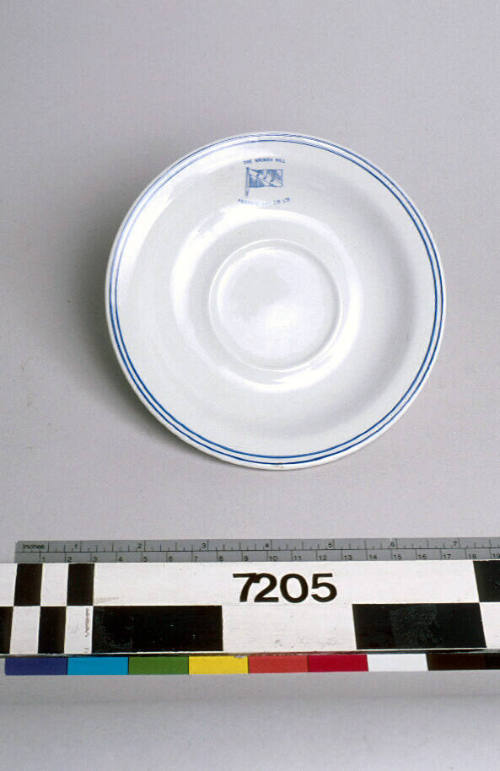 White saucer with house flag from MV IRON CARPENTARIA.