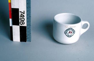 Ceramic cup from MV TARINNA, William Holyman & Sons Pty Ltd